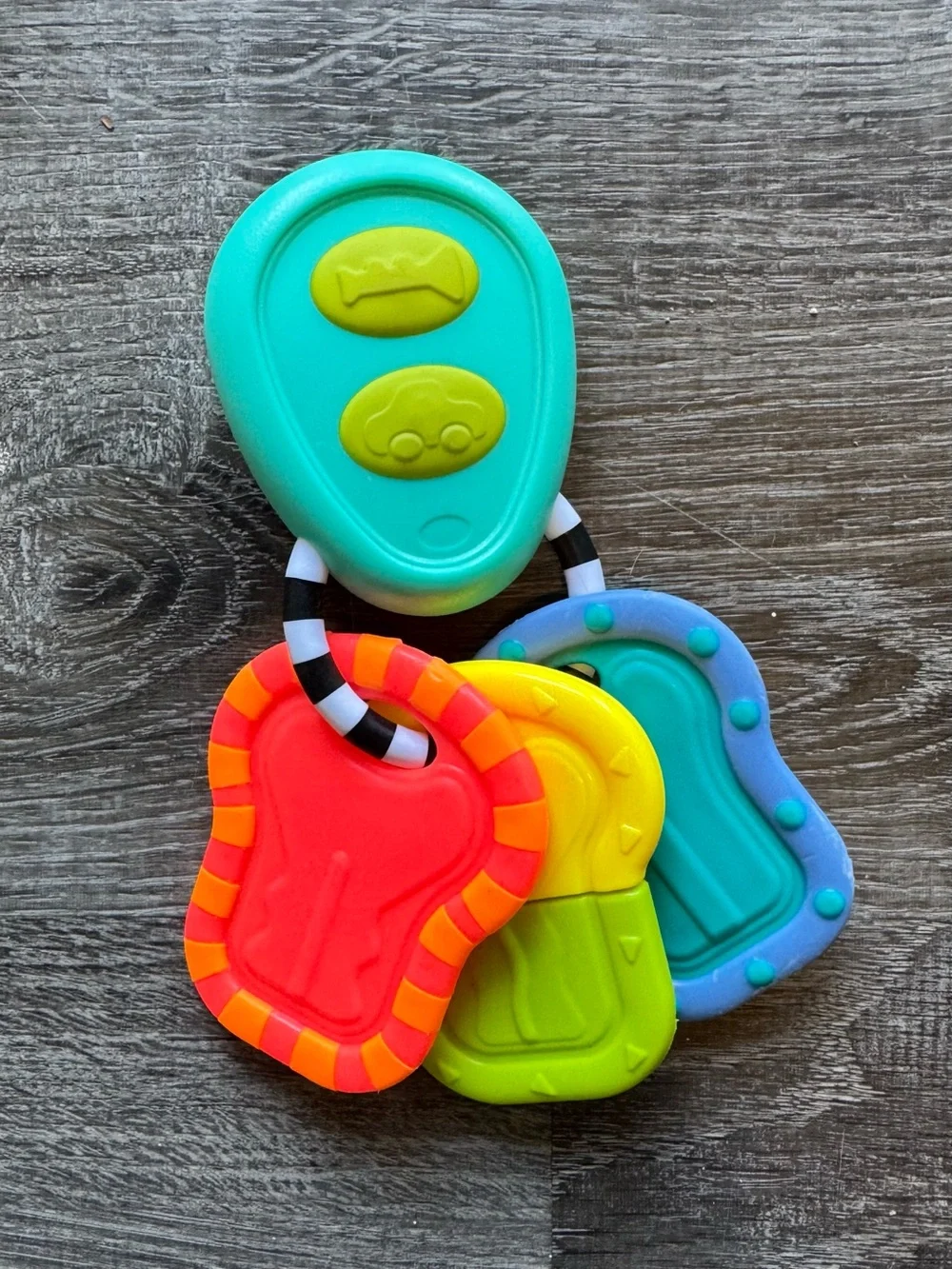 Sassy baby rattle with four colorful keys